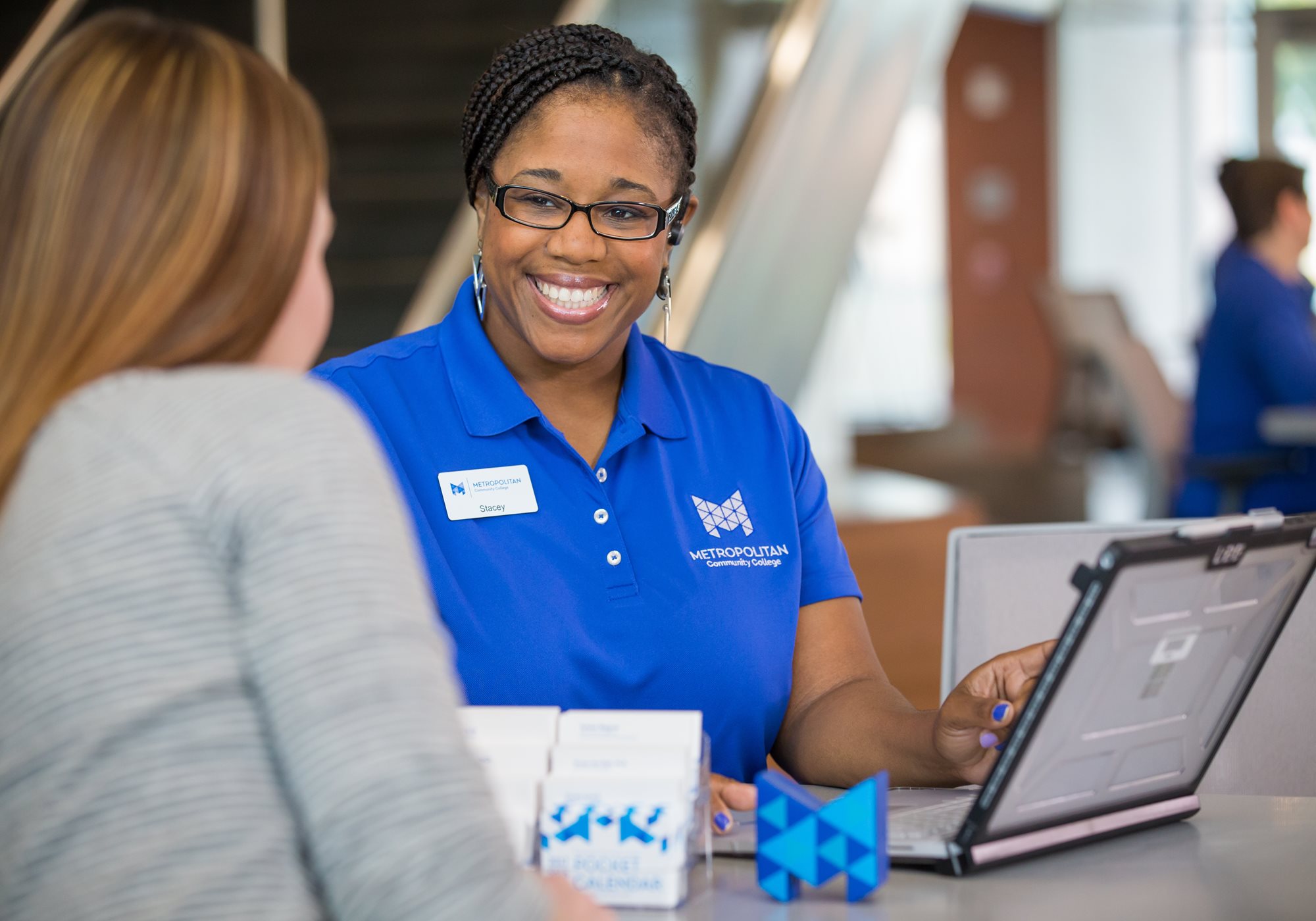 Female customer service leader helping female Customer