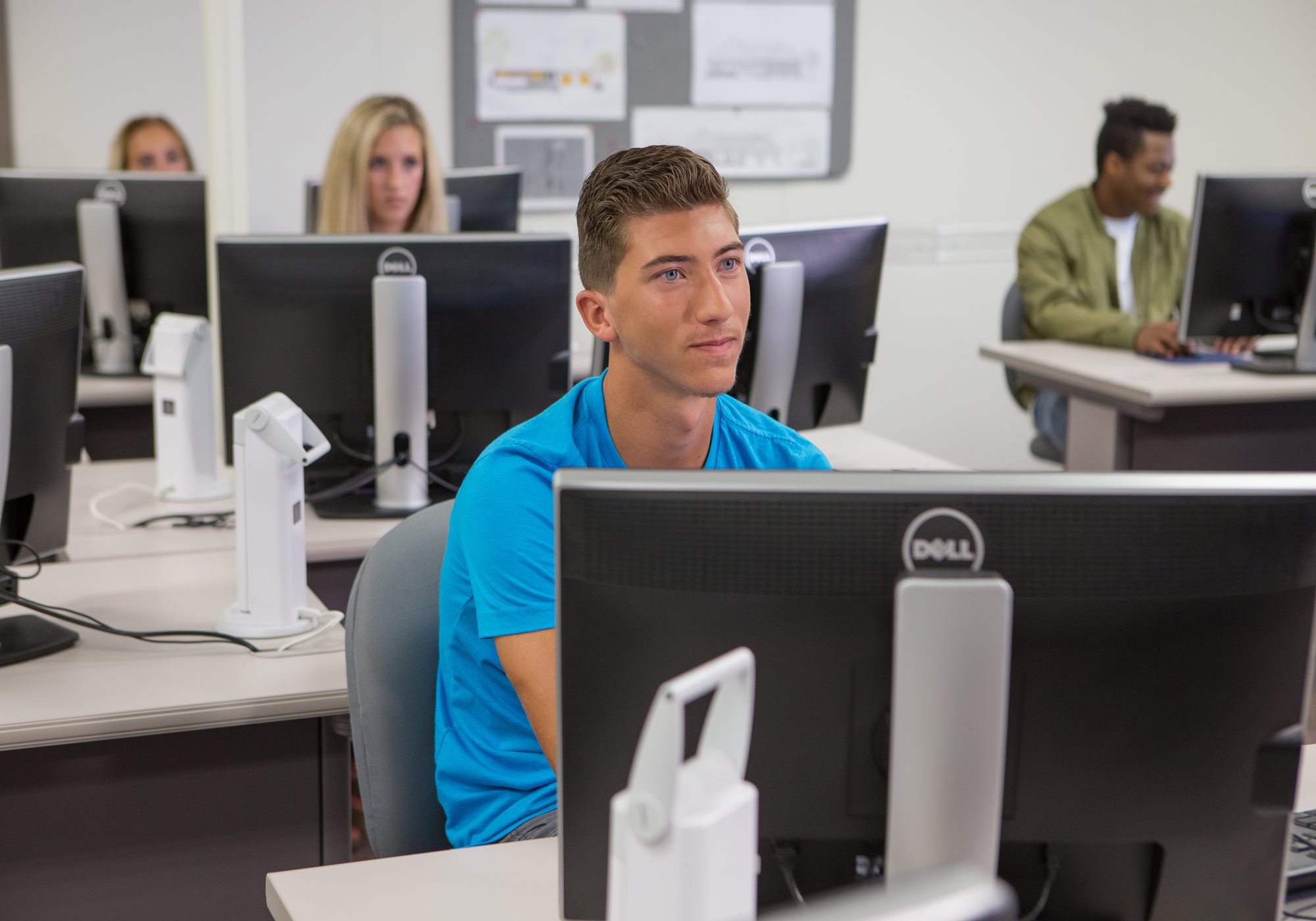 Male Student Looking at Monitor