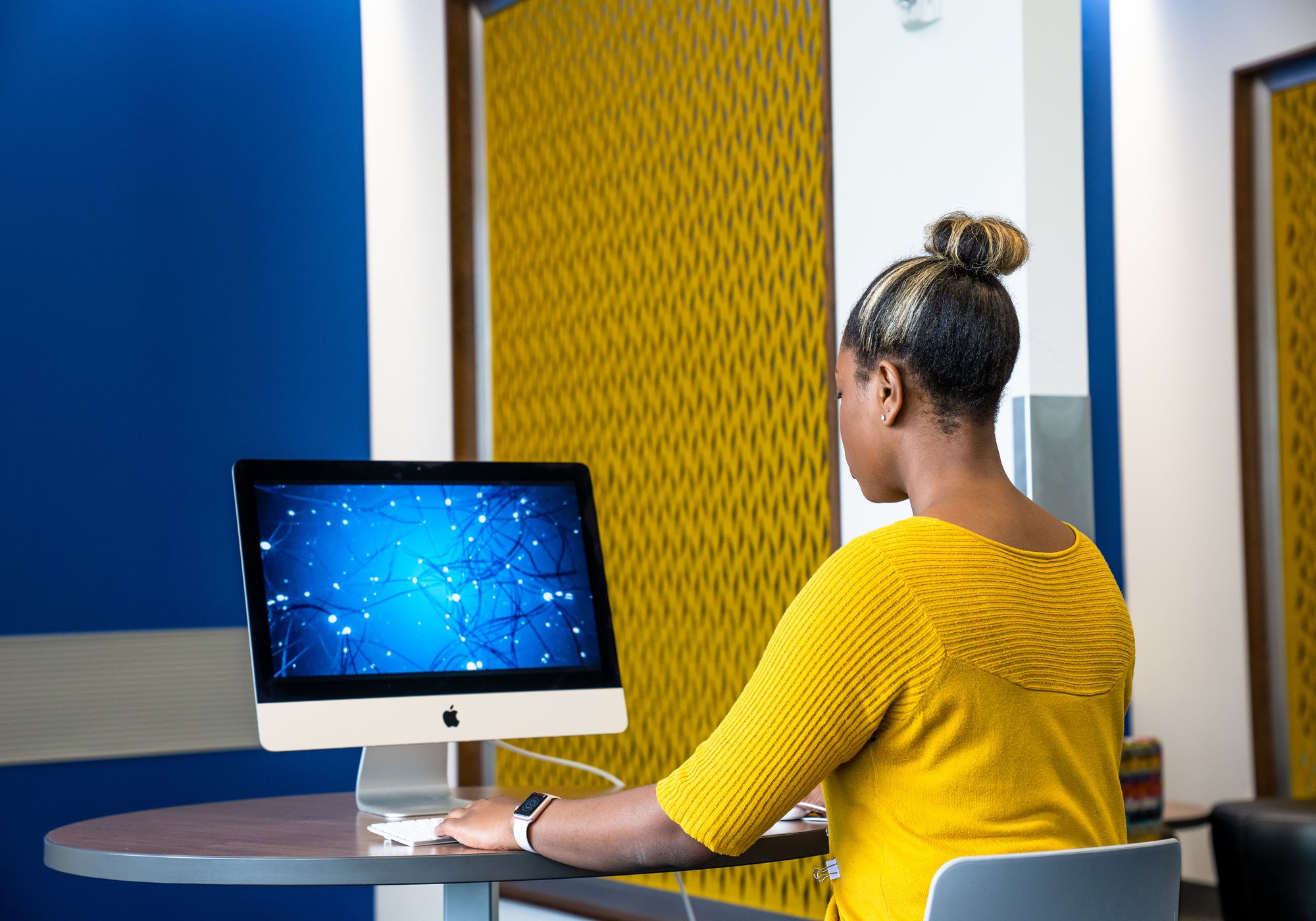 Female Student Looking at Monitor