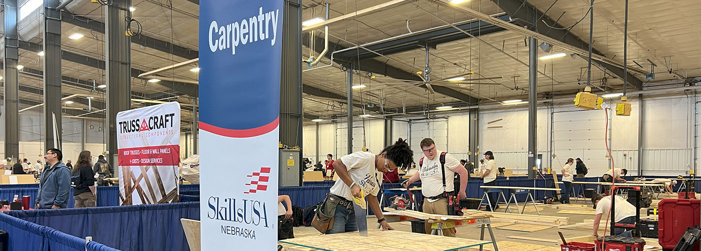 MCC carpentry student sawing at SkillsUSA Nebraska