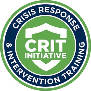 A graphic of a green and blue circular pin representing certification in the Crisis Response and Intervention Training Initiative