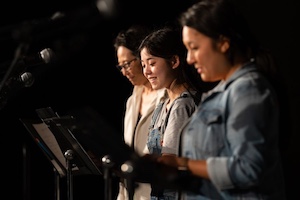Women performing onstage